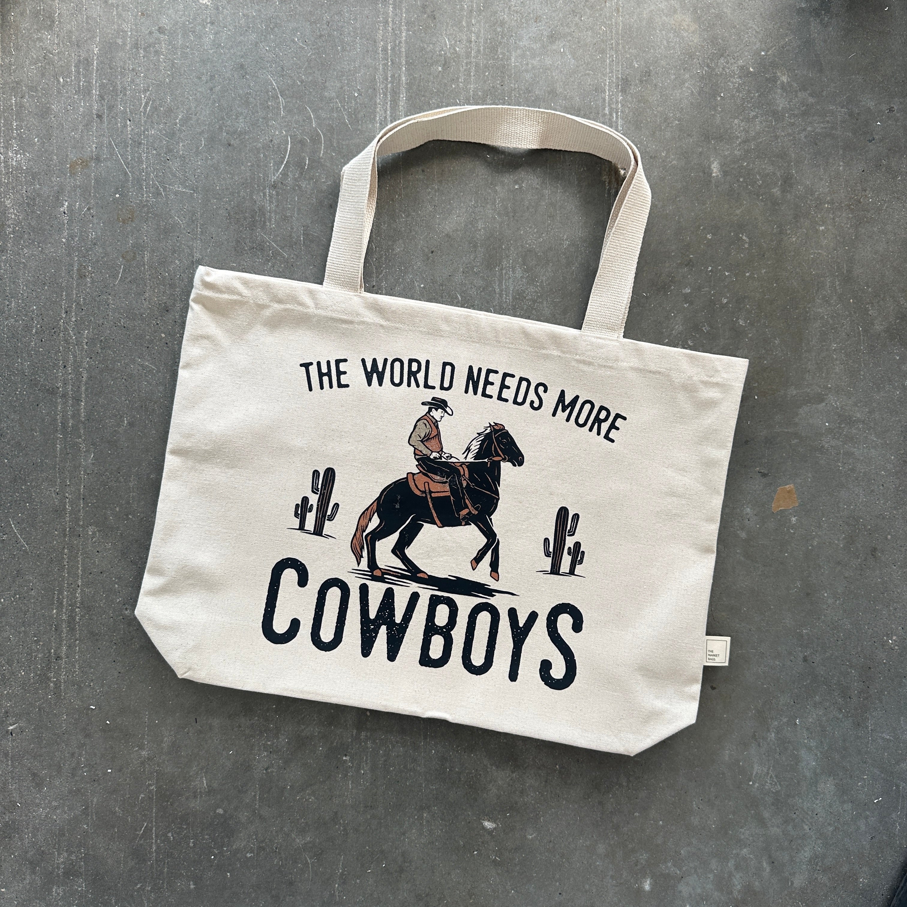 The World Needs More Cowboys Tote Bag
